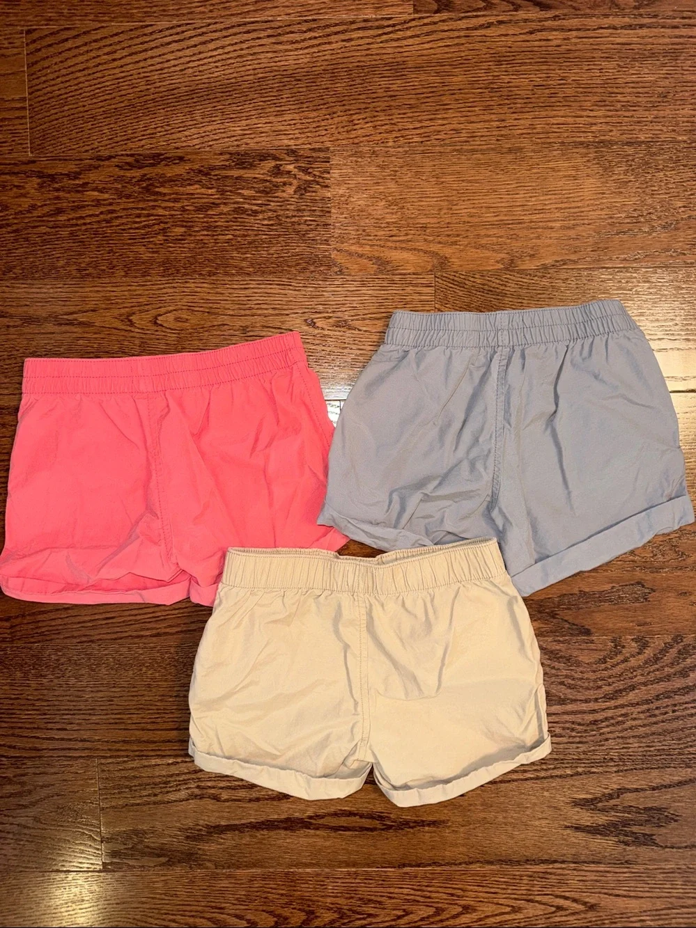 Size 8/M girls bundle of 3pull-on shorts from Old Navy. Pink, gray, khaki.